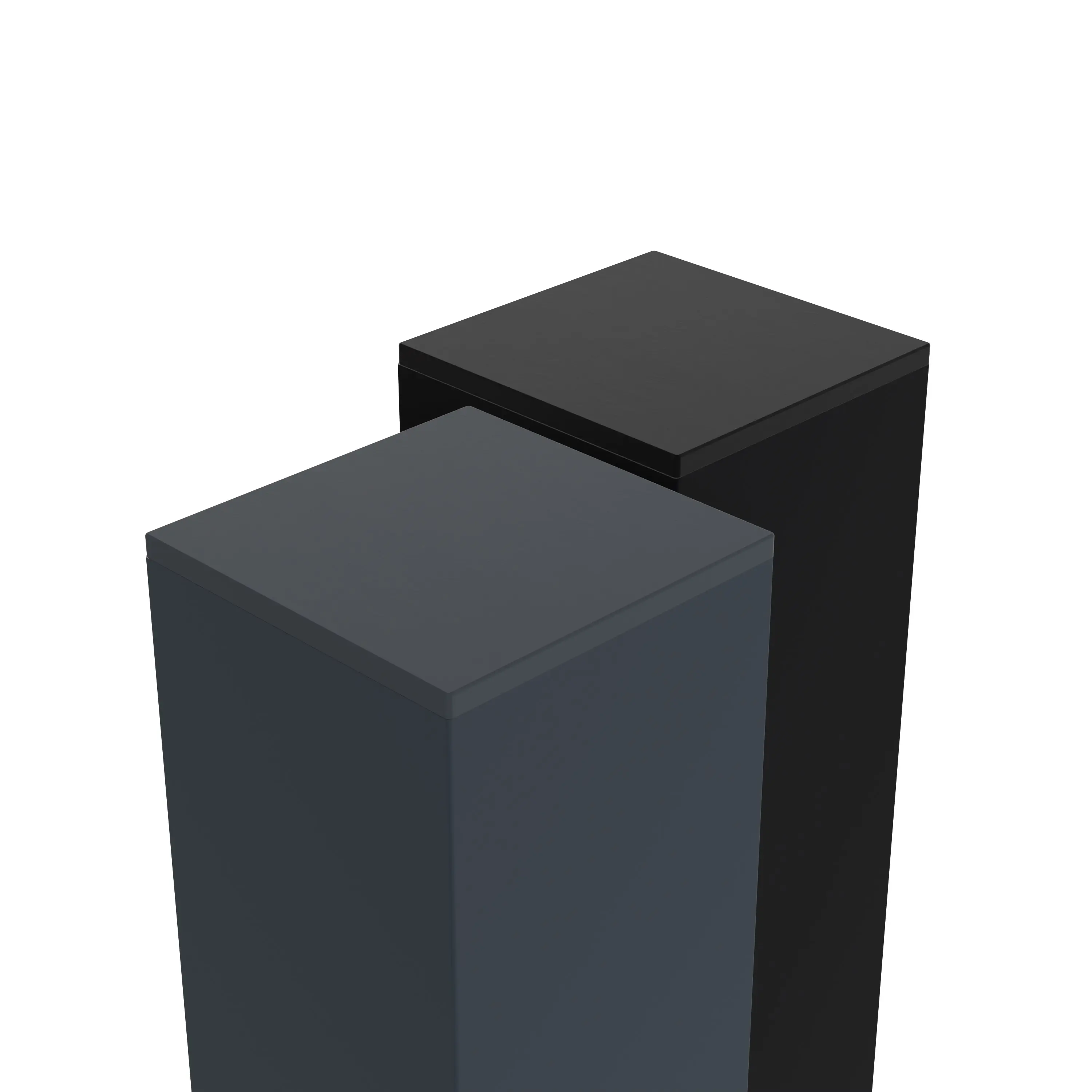 Deux blocs rectangulaires foncés de hauteurs différentes, côte à côte sur fond blanc ; matériau et référence non lisibles.